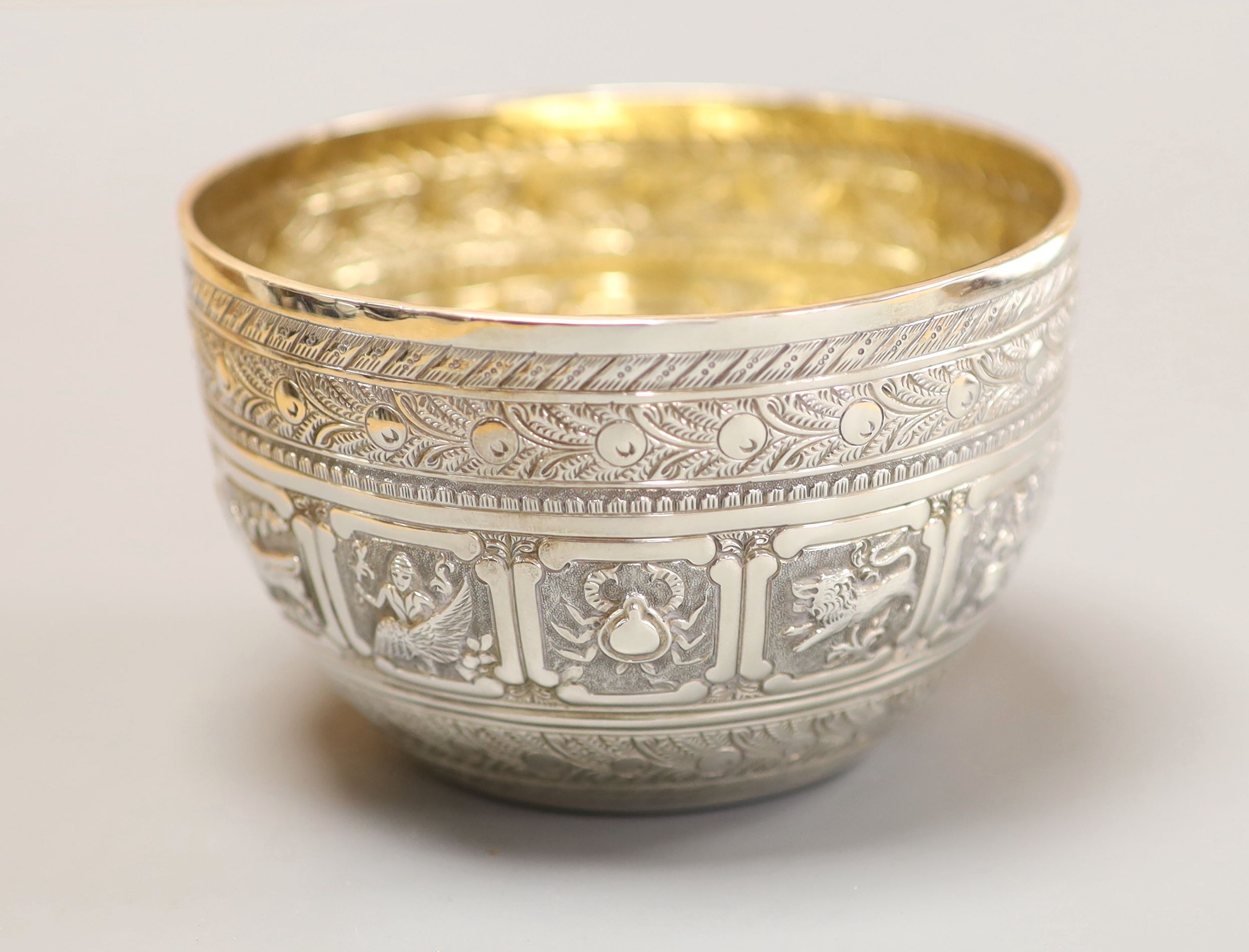 A Victorian silver 'zodiac' sugar bowl, Charles Boyton, London, 1880, height 6cm, 99 grams.